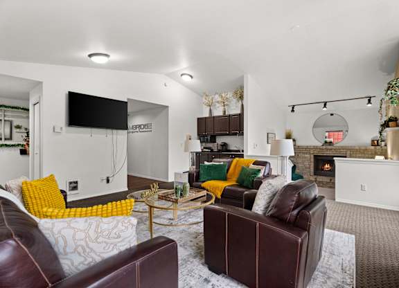 A living room with a fireplace and a couch.