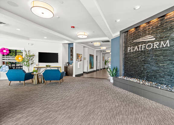 A conference room with a sign that says "PLATFORM".