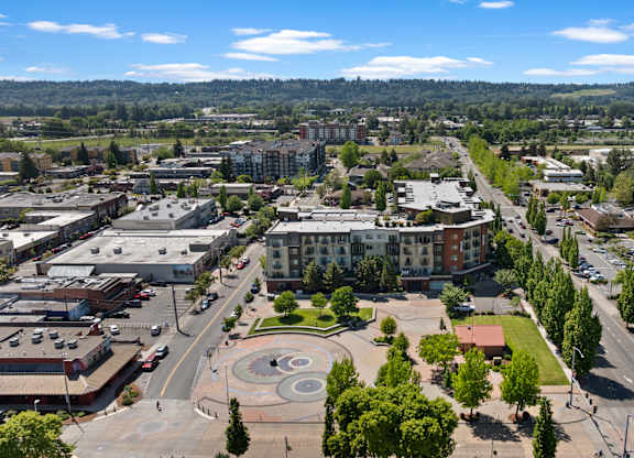 A cityscape with a large open square in the middle.