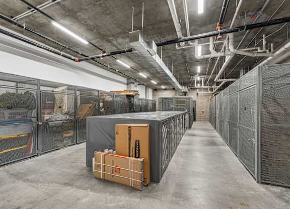 A long hallway with a box on the floor.