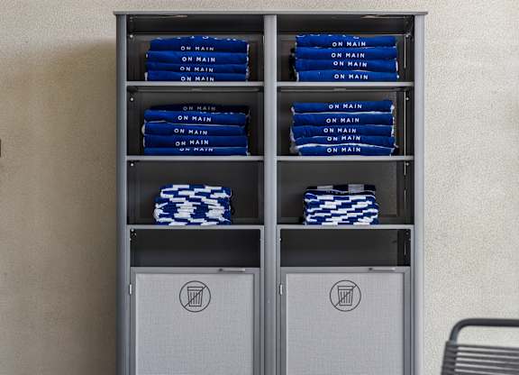 A shelf with blue and white items on it.