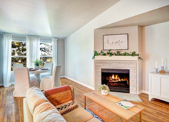 The Lynx Living Room with Fireplace at The Lynx Apartments, Everett, 98204
