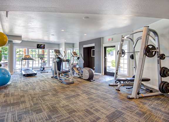 Fitness center at Deer Creek Apartments, Puyallup, WA, 98373