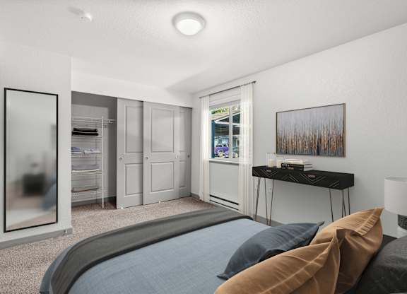 A bedroom with a large bed and a painting on the wall.