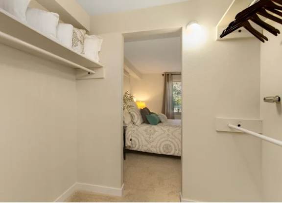 A small bedroom with a bed and a window. at The Retreat, Sumner, Washington