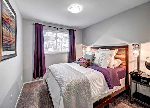 Puyallup Apartments- Deer Creek Apartments- bedroom at Deer Creek Apartments, Puyallup, Washington