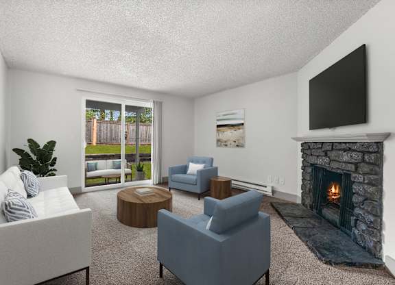 A living room with a fireplace and a television.