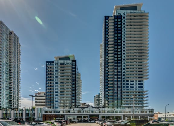 two high rise buildings in the city at Versus Apartments, Alberta, T2R 1A8