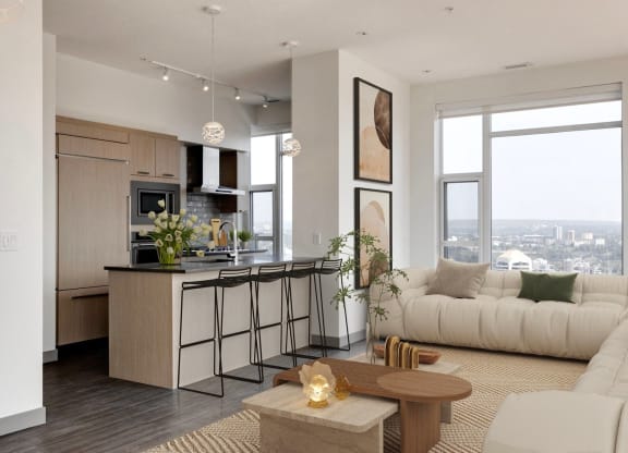 a living room and kitchen in an apartment at Versus, Calgary, AB