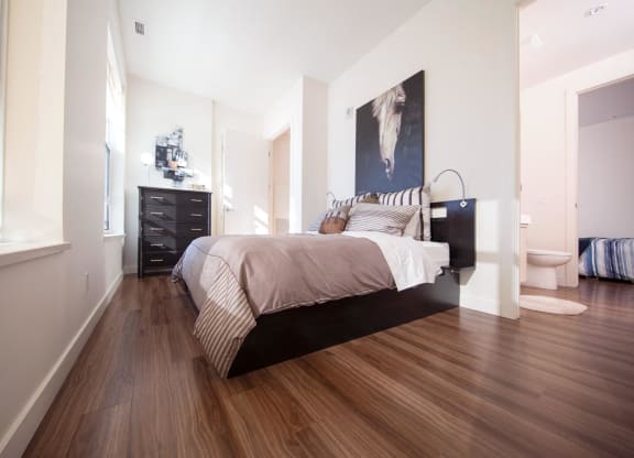 Comfortable Bedroom With Closet at Versus Apartments, Calgary, AB