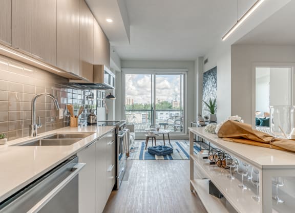 Kitchen With Custom Cabinetry at Southpark, Alberta