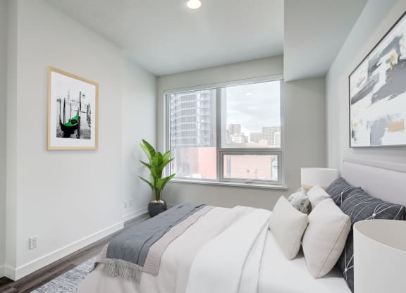 Comfortable Bedroom With Large Window at BLVD Beltline, Calgary, AB, T2G 2K4