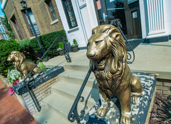 Abby-The Abby Apartments Entrance Lion Photo