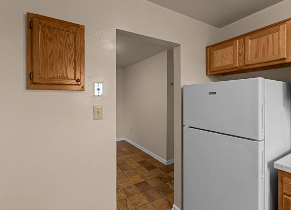 A white refrigerator in a kitchen at Kensington House, Kensington, MD