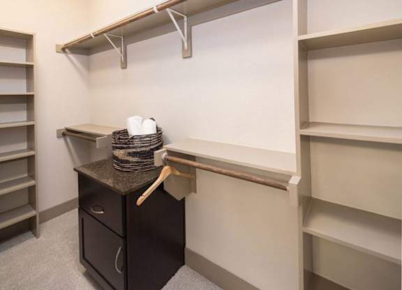 StoneLedge Apartments - walk in closets custom shelving - Grapevine Lake Apartments