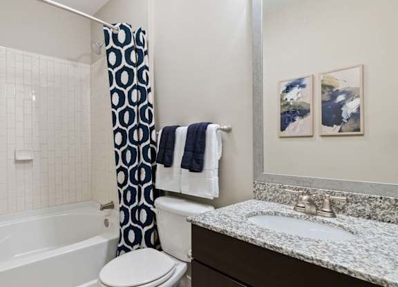Central Raleigh Apartments on the Greenway - Marshall Park Bathrooms with granite countertops