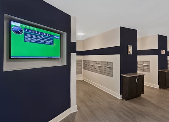Crabtree Apartments in Raleigh near Red Hat - Marshall Park mail room with package notification