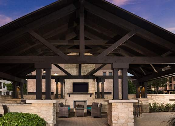 StoneLedge Apartments - Outdoor pool lounge - Apartments near Grapevine Mills Mall