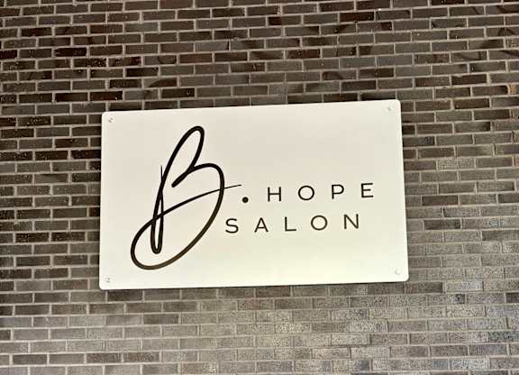 A white sign with the word