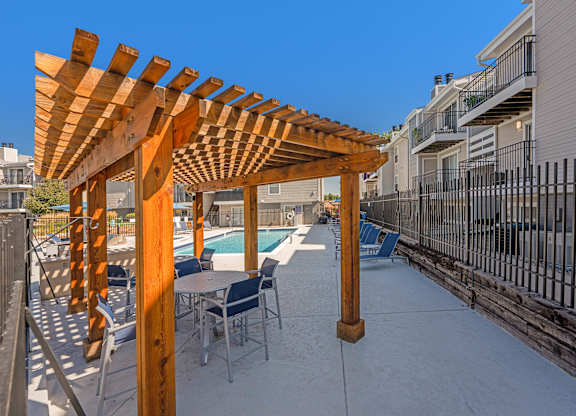 The Huntington Pool and cabana with seating