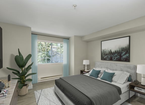a bedroom with a large bed and a large window