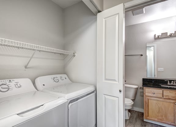 a laundry room with a washer and dryer