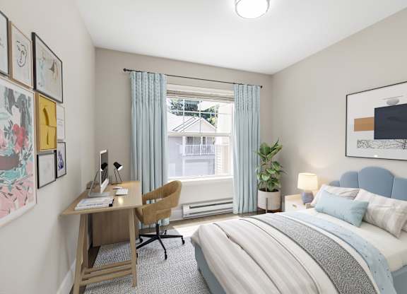 A bedroom with a bed, desk, chair, and window.