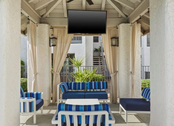 Del Sol Apartments Poolside Patio Lounge with TV