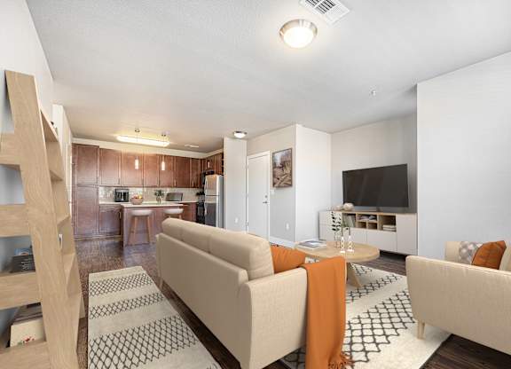 A living room with a couch and a television.