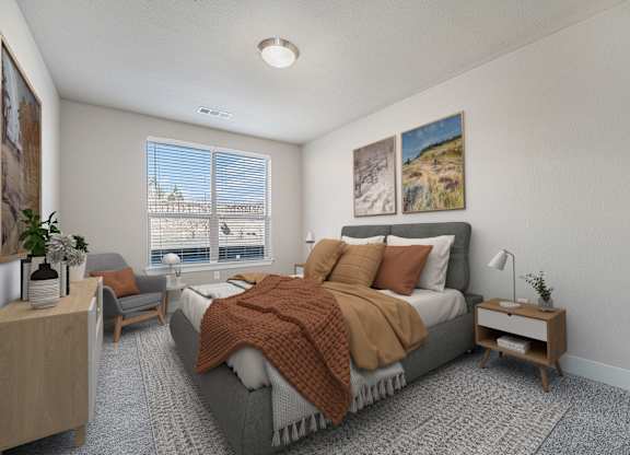 A bedroom with a large bed and a window overlooking a cityscape.