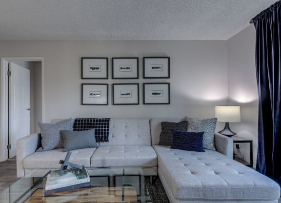 a living room with a couch and a coffee table