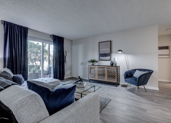 a living room with a couch and a chair