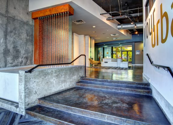 a view of the lobby from the top of the stairs