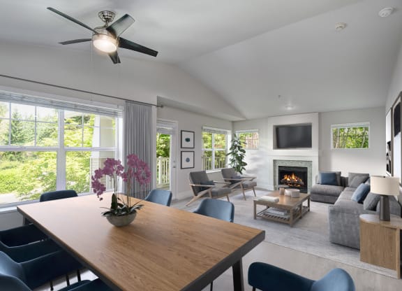 a living room filled with furniture and a fire place