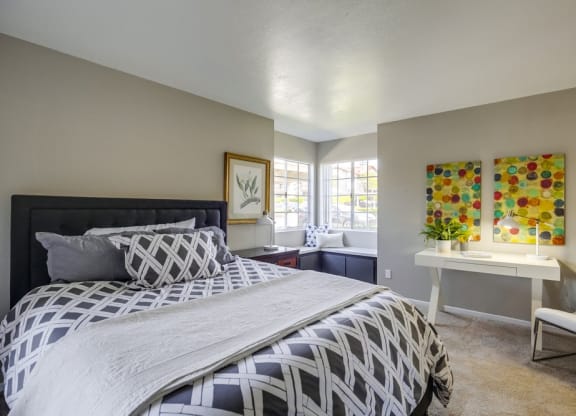 Vista Promenade Apartments in Temecula, CA with wall to wall carpet, a huge closet, and white walls at Vista Promenade Apartments, California