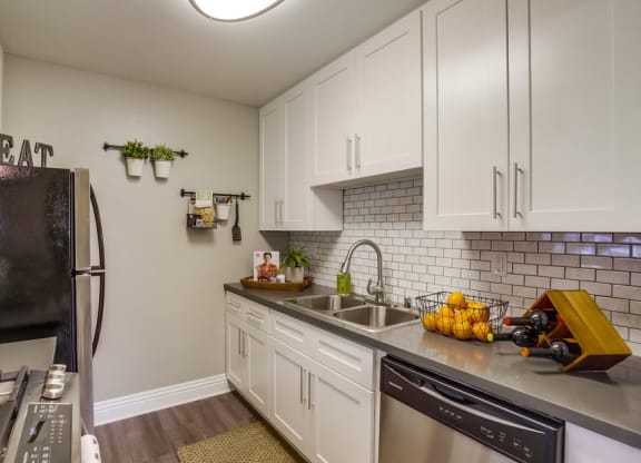 Apartments for Rent in Temecula- Vista Promenade- Stainless-Steel Appliances with Tile Backsplash and Modern-Style Cabinets at Vista Promenade Apartments, Temecula