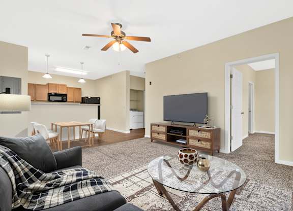 Living Room With TV at Deer Valley Apartments, Silvis, Illinois