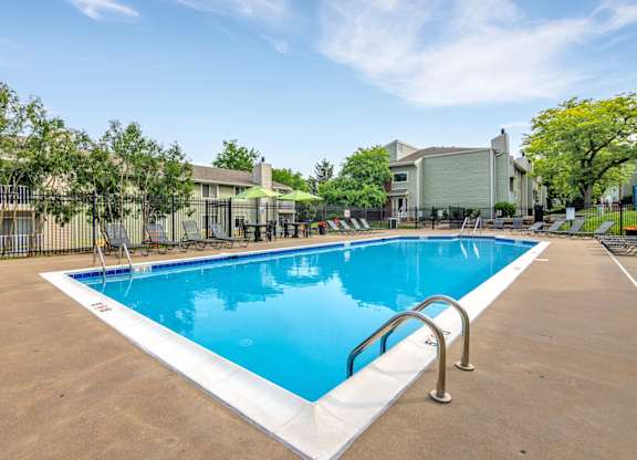 A large outdoor swimming pool at Winding Hills Apartments, Iowa
