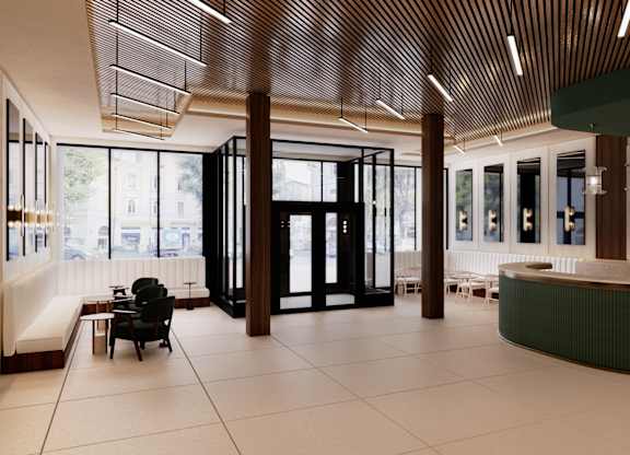 the lobby of a building with a reception desk and chairs at The Woods at 180 Kanata Avenue, Ontario