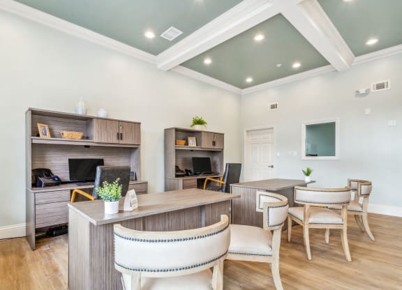 a living room with a desk and chairs at Reserve at Temple Terrace, Temple Terrace, 33637