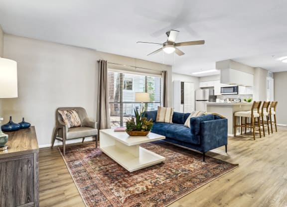 a living room with a couch and a coffee table at Reserve at Temple Terrace, Temple Terrace