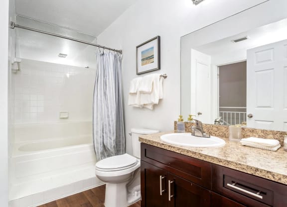 a bathroom with a sink toilet and shower at Waterford Park Apartment Homes, LLC, Lauderhill, FL