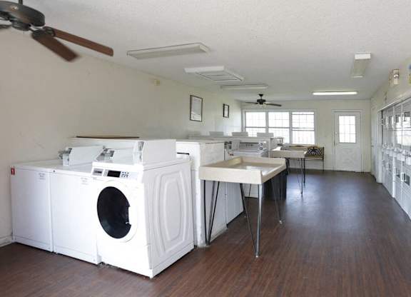 A laundry room with a washer and dryer.