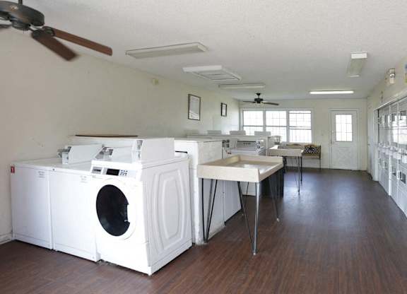 A laundry room with a washer and dryer.