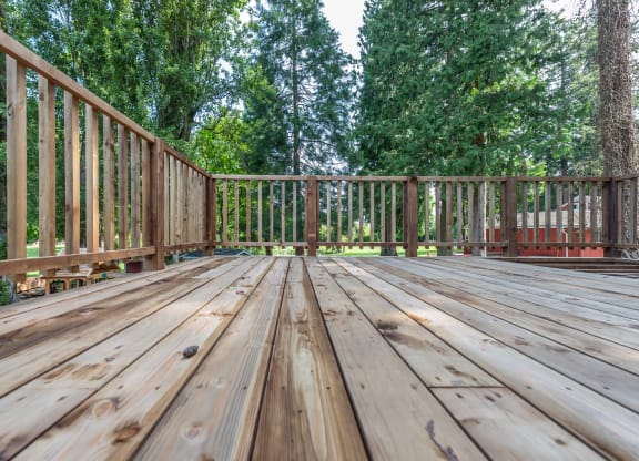 a deck with a wooden floor