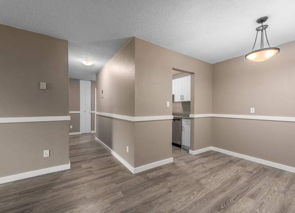 A room with a washer and dryer in it.