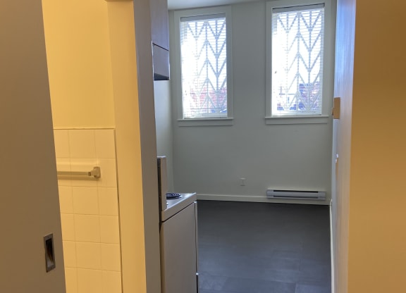a view of the kitchen from the top of the stairs