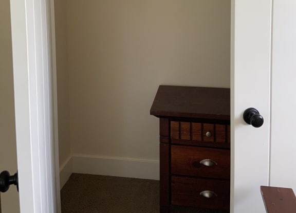 an empty medicine cabinet in a bathroom