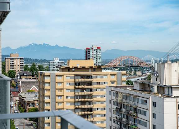 a view of the city of vancouver and the mountains in the background