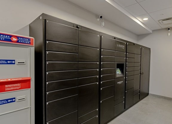 a group of metal lockers in a room
